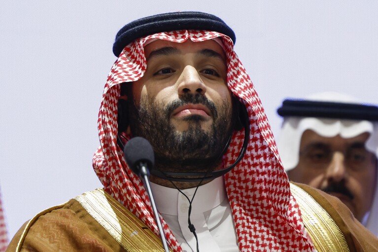 FILE - Saudi Arabian Crown Prince Mohammed bin Salman attends a Partnership for Global Infrastructure and Investment event at the G20 summit in New Delhi, India, Sept. 9, 2023. Saudi Arabia's most recent venture into the global sports scene — purchasing a stake in the Professional Fighters League — is yet another example of the oil-rich kingdom using athletics to increase its influence. (AP Photo/Evelyn Hockstein, Pool, File)